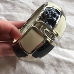 Cream+black enameled hinge bracelet, silver toned